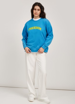 Light blue jersey sweatshirt with print "Freedom" by Must Have