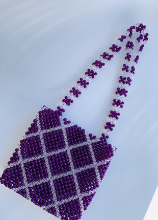 women's stylish bag. decoration for the image. bag made of beads. a gift for a girl2 photo